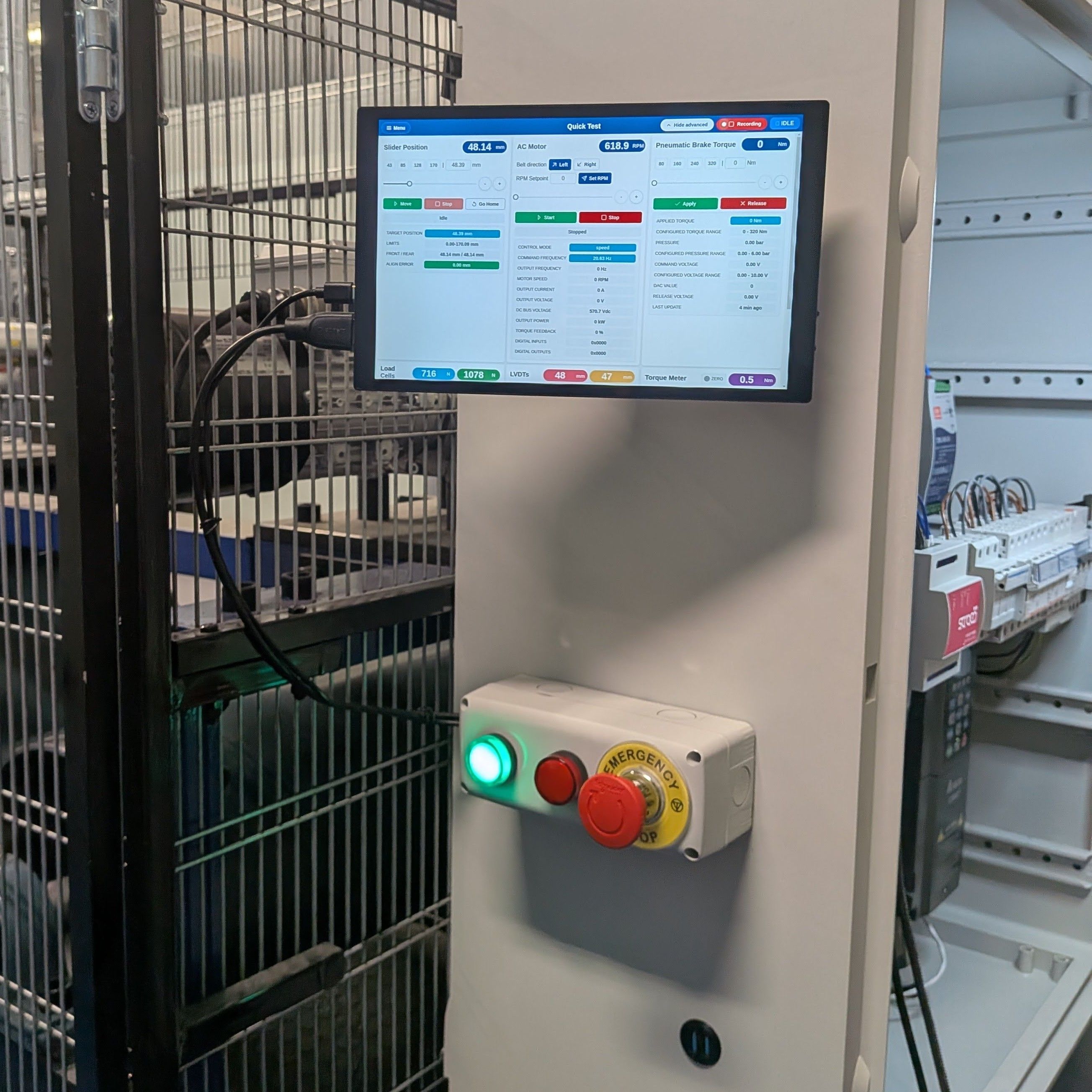Industrial test bench with operator HMI, machine controls and electrical cabinet